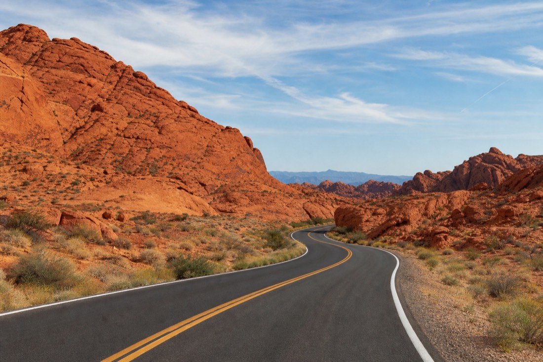 The paved Scenic Drive winding through the red sandstone